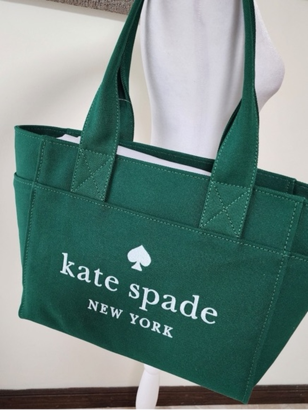 kate spade green canvas tote with white logo